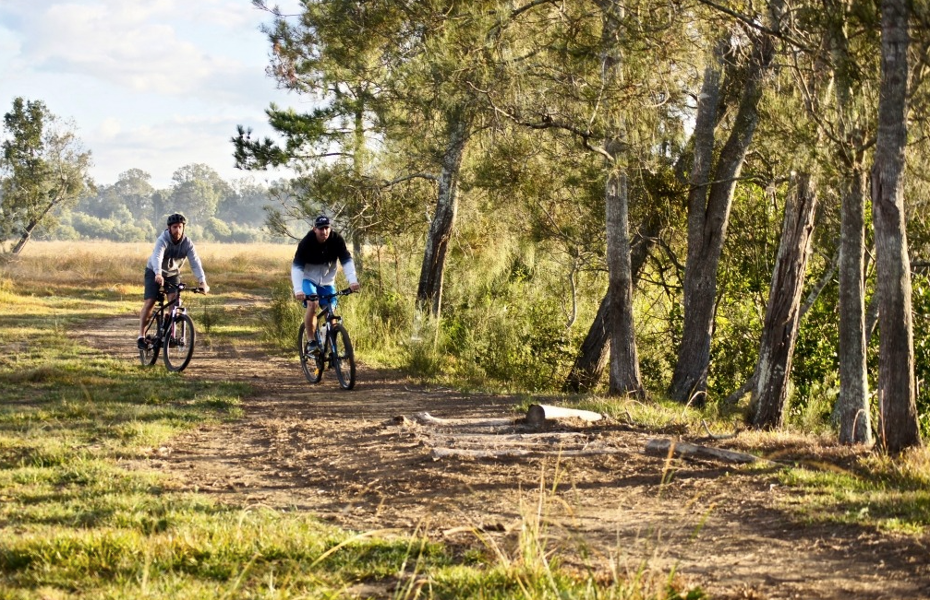 Two men riding their bikes on the North Harbour Mountain Bike Trail